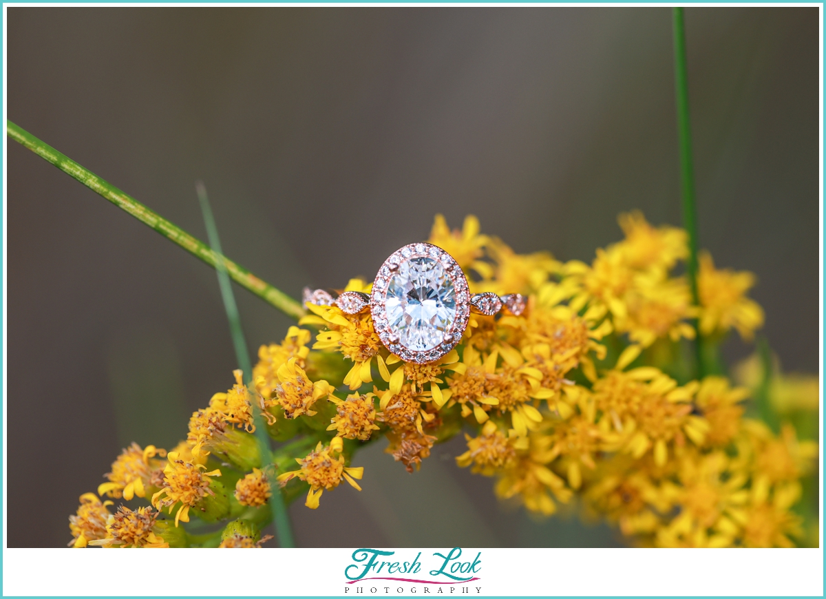 diamond ring on yellow flowers