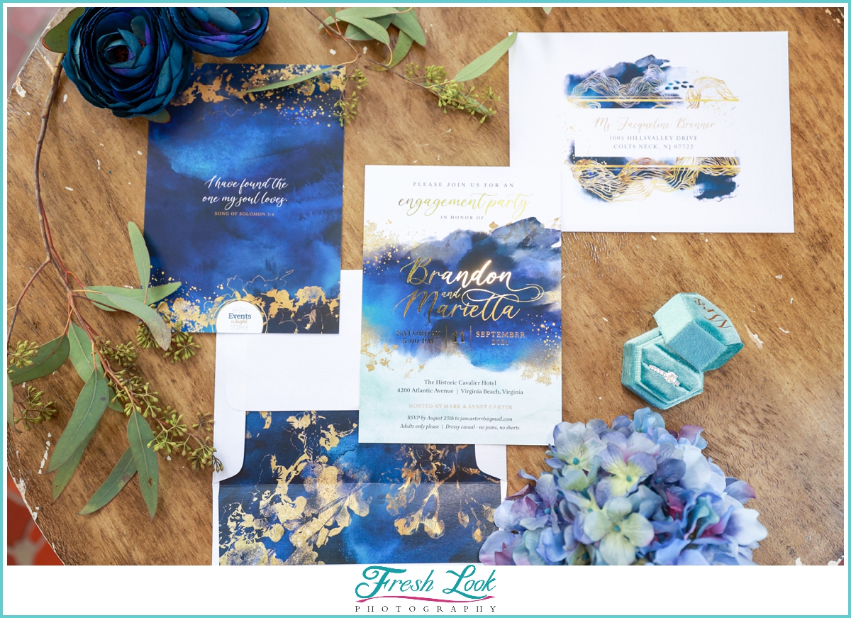 blue and gold wedding stationery