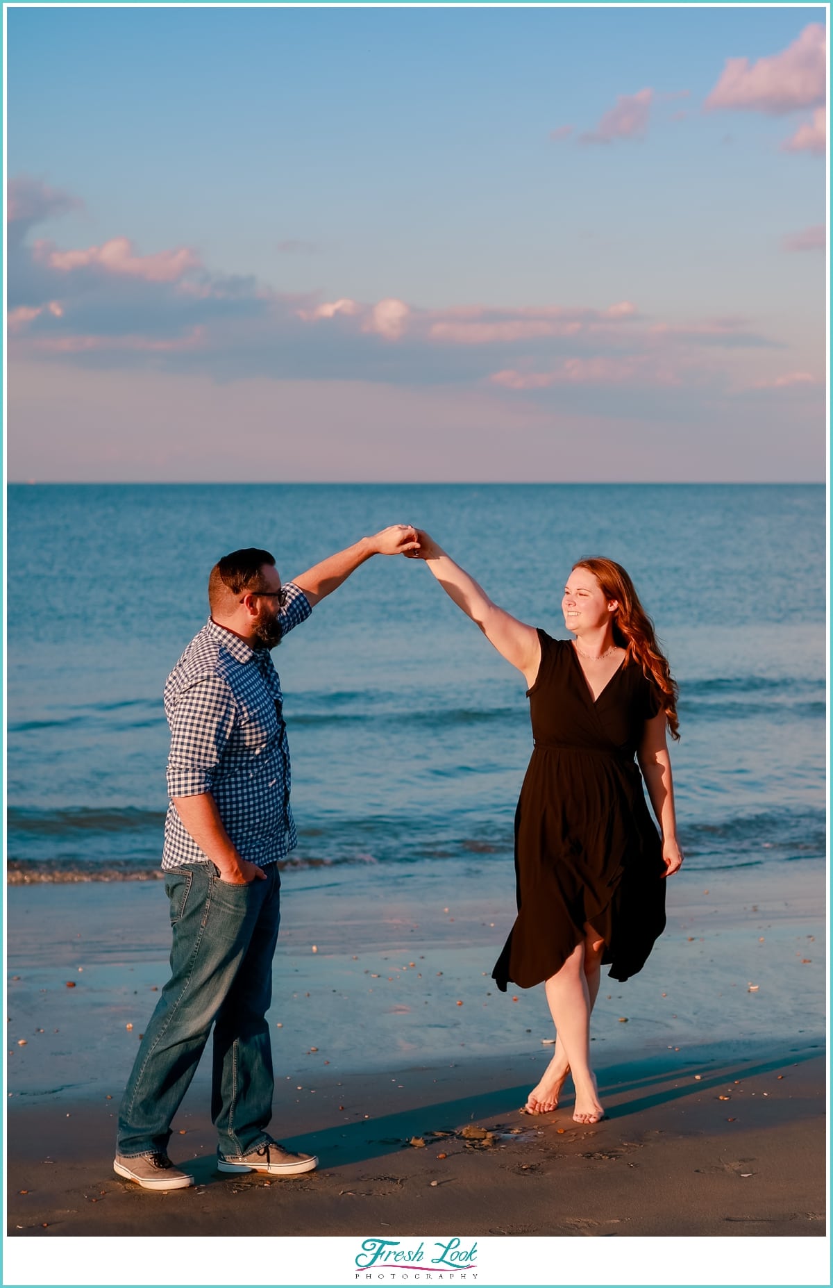 dancing during engagement session