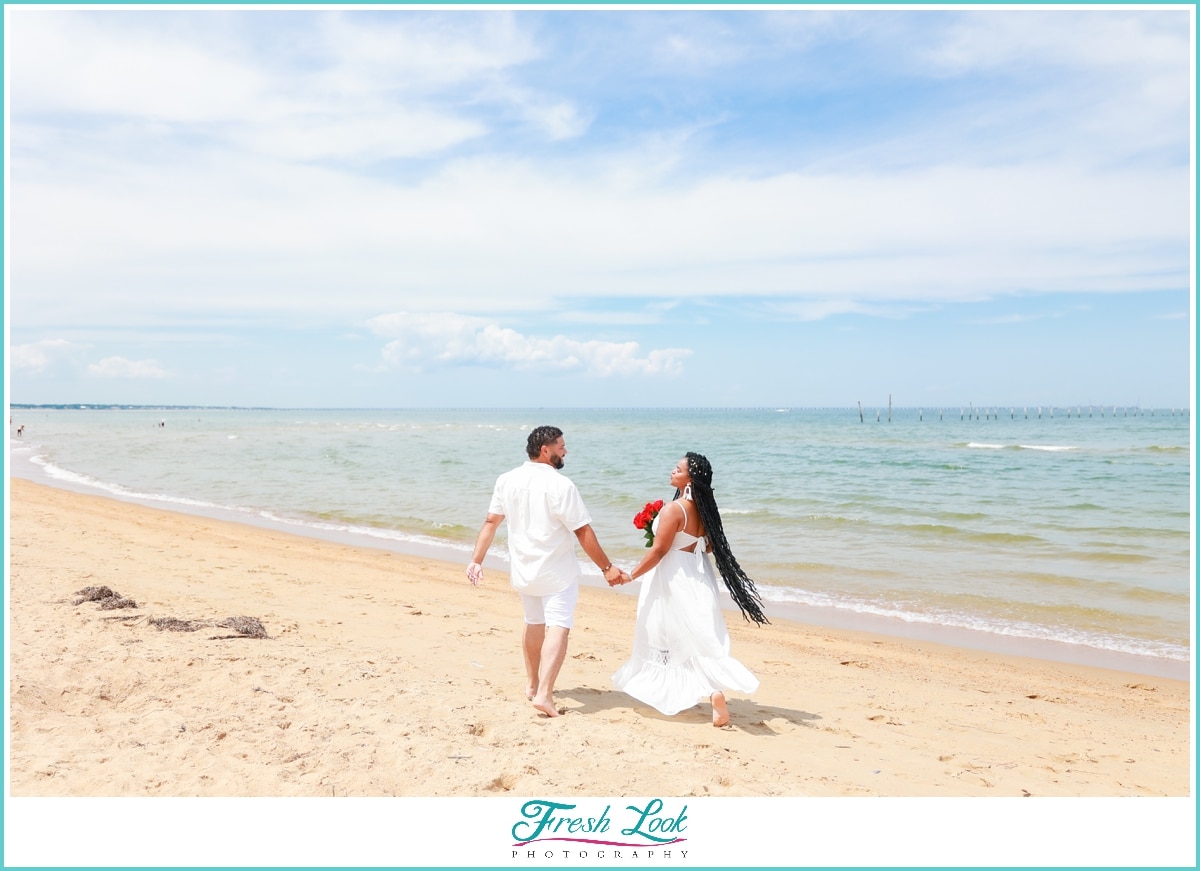 romantic couples walk on the beach